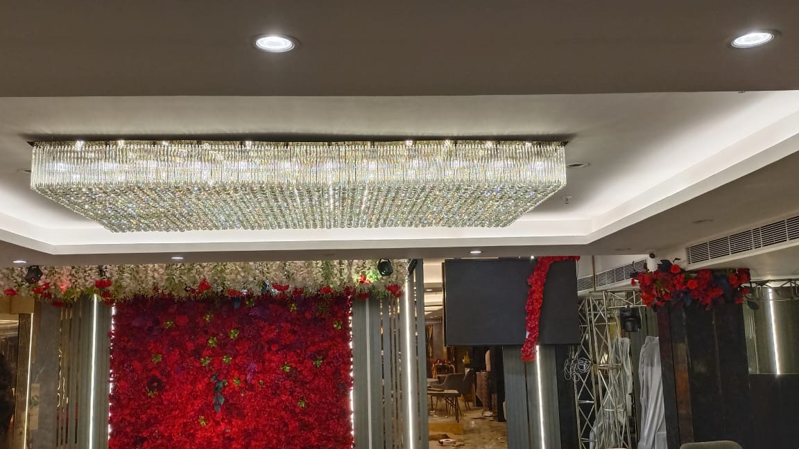 Rectangular crystal chandelier installed in the Tunight Restro and Banquet project