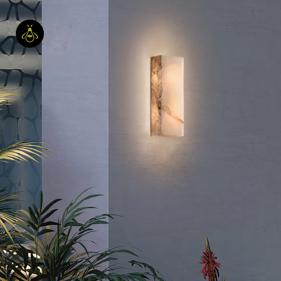 Alabaster Outdoor Wall Light – 65 cm IP65 Stone Sconce 9 Wall mounted alabaster outdoor wall light with integrated LED on a timber clad villa wall