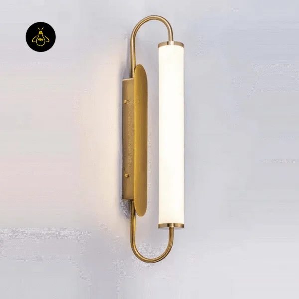 Side view of the gold thin wall light showing the oval backplate, two fixing screws and the 50 cm opal acrylic tube