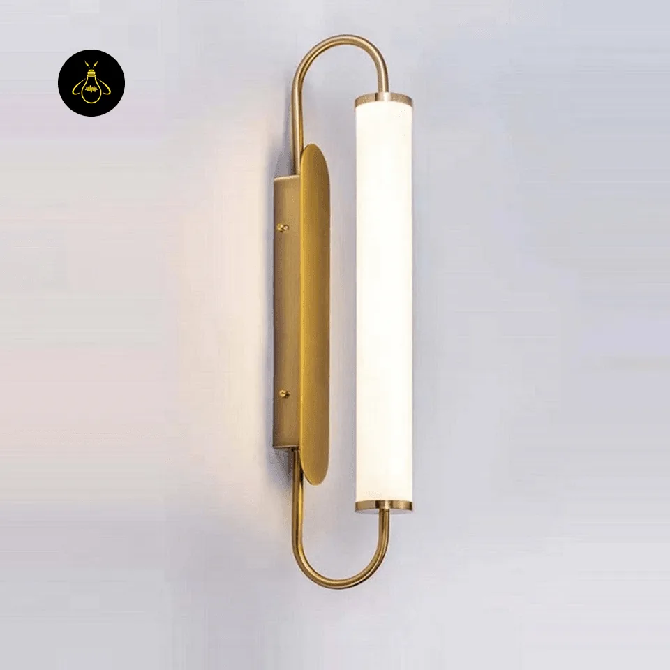 Gold LED Wall Light – 50 cm Acrylic Tube Sconce for Bedside 7 Gold LED wall light giving a warm diffused glow in a cozy bedroom