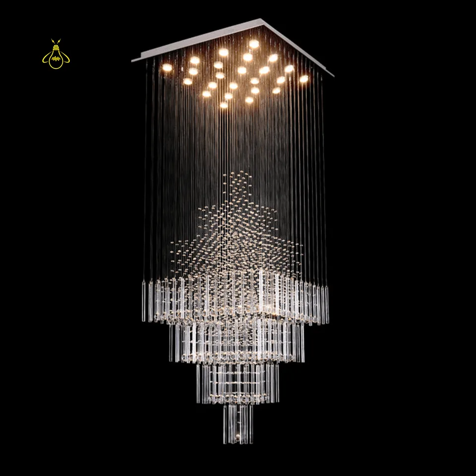 Raindrop Crystal Chandelier – Multi-Tier K9 Cascade for Staircase & Foyer 2 Rectangular raindrop crystal chandelier lit with warm-white spotlights for a double-height foyer