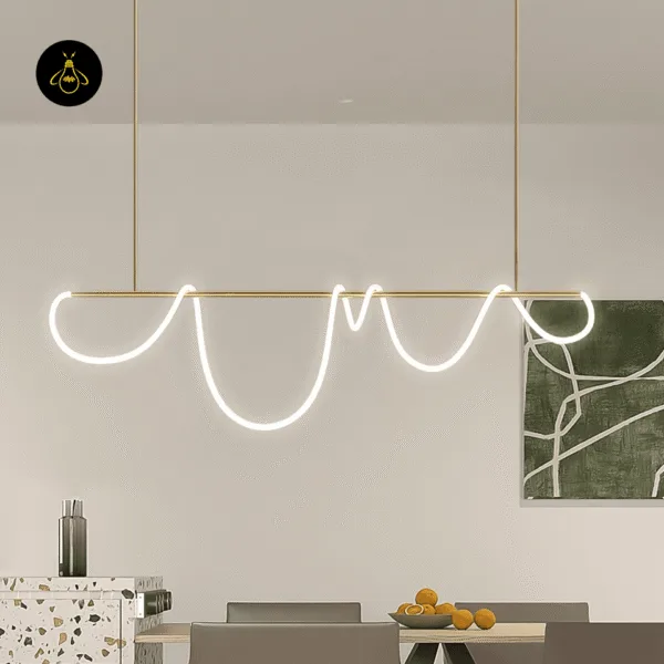 Warm white integrated LED glow of the gold linear chandelier