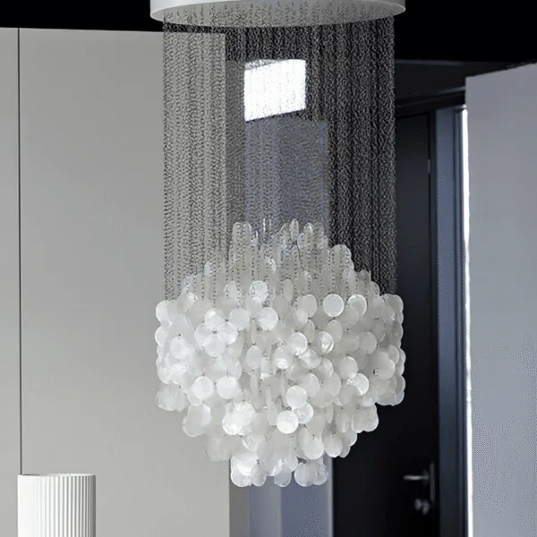 Close-up of iridescent capiz shells and chrome finish on the chandelier