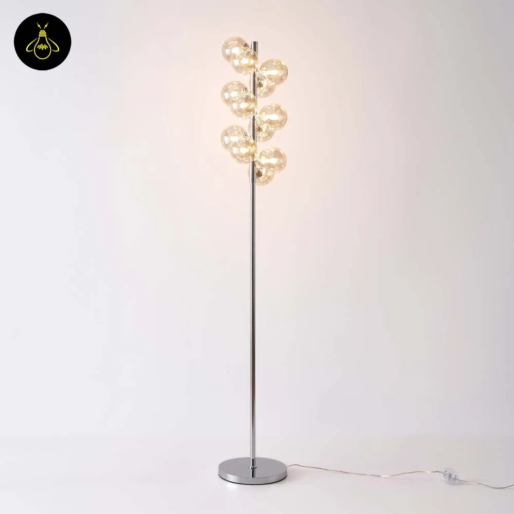 Amber Glass Floor Lamp – 12-Globe Polished Chrome, 157.5 cm 7 Amber glass floor lamp with warm glow on a plain background