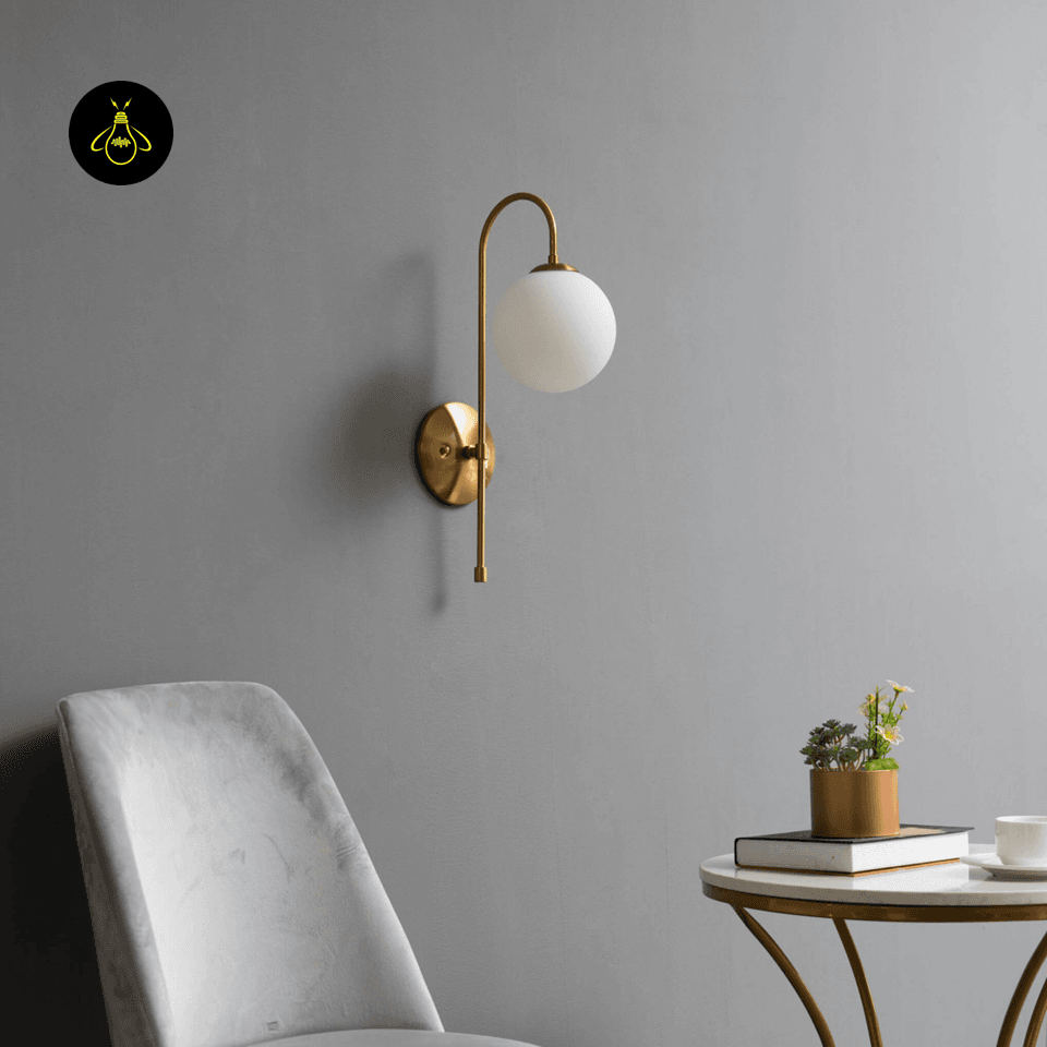 Gold Wall Light for Living Room – Oriol 48 cm Globe Sconce 3 Gold glass wall light casting a warm diffused glow for living room walls