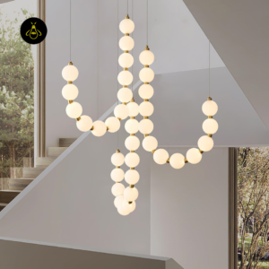 Artistic draped pearl chandelier with opal glass orbs for a foyer