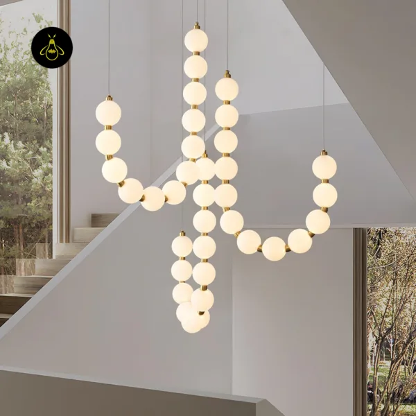 Artistic draped pearl chandelier with opal borosilicate glass orbs for a foyer