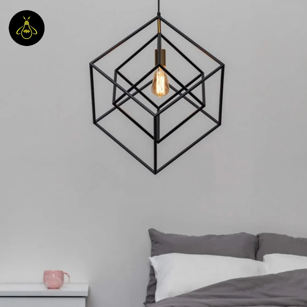Black cage pendant light in a living room, 57 cm geometric cube in matte black metal