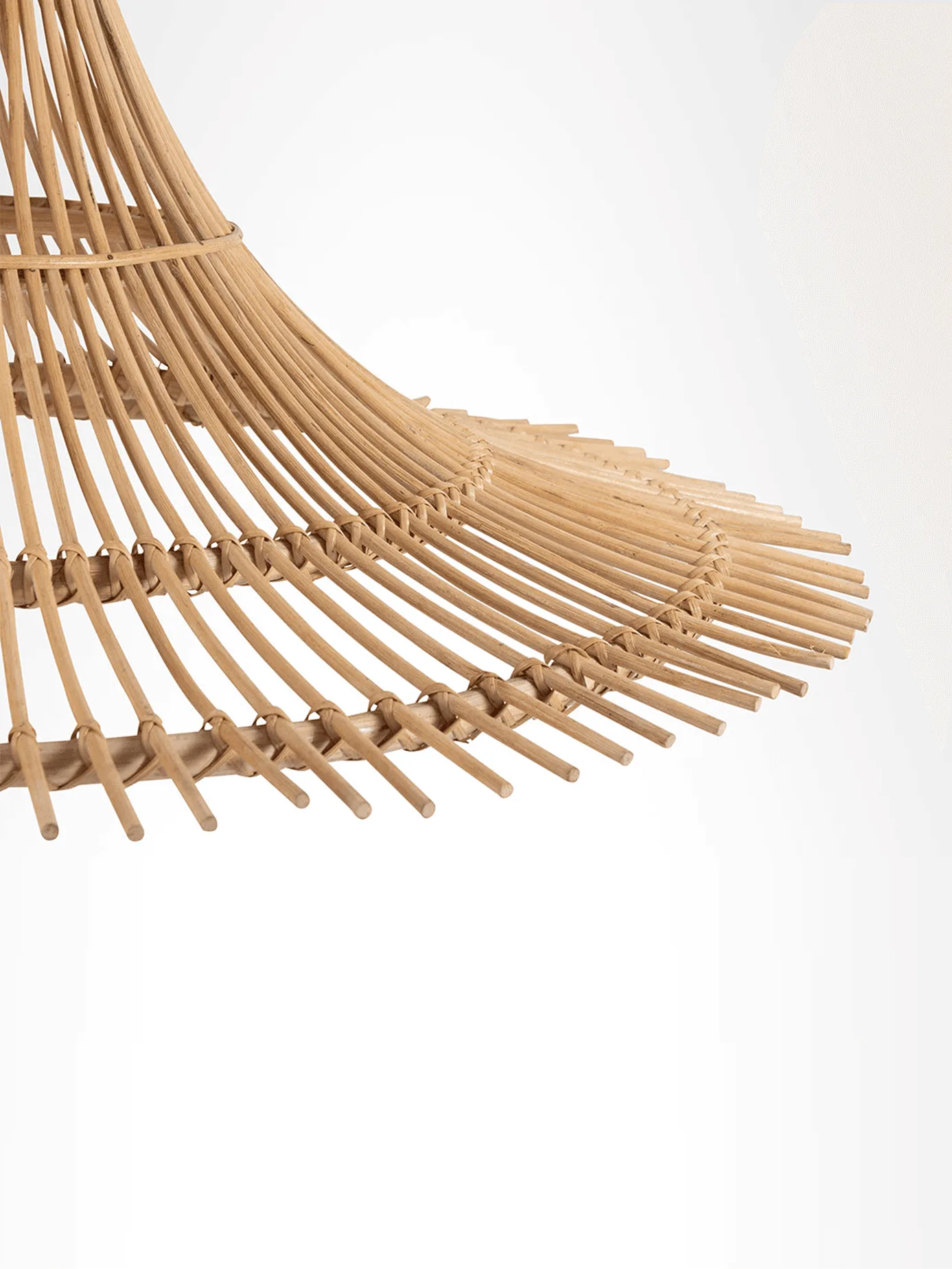 Bamboo Pendant Light – Woven Shade, 43-Inch Black-Finish Fixture 3 Cane-style bamboo pendant light hanging over a dining space