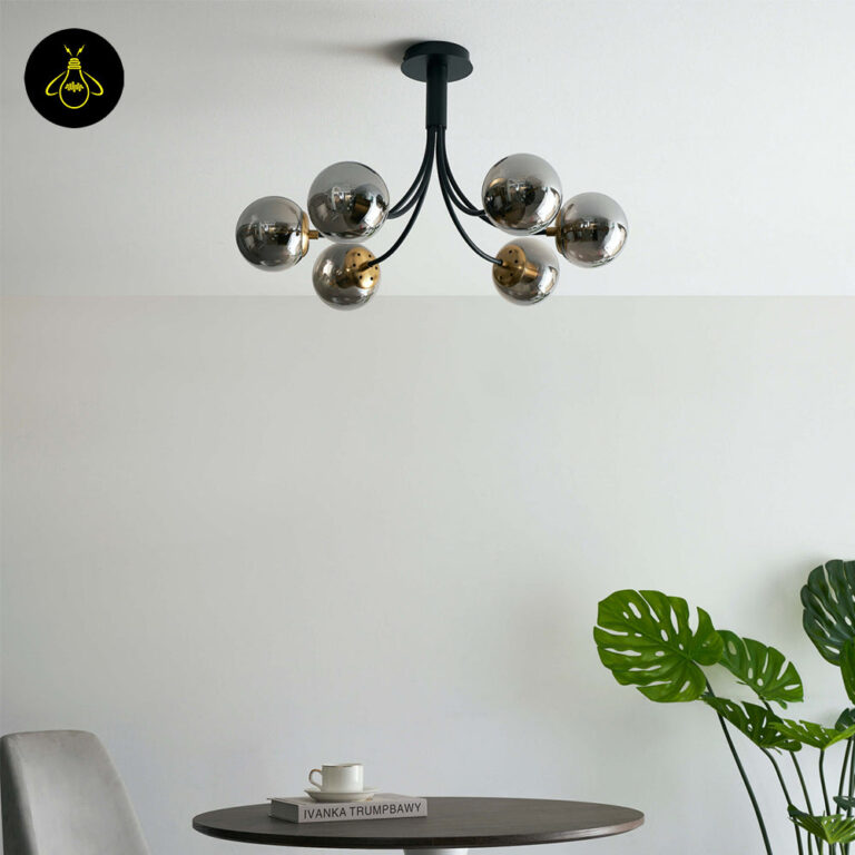 Black glass ball chandelier lighting a modern living room