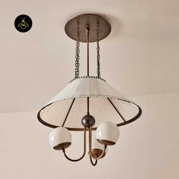 Opal borosilicate glass chandelier hanging over a dining room table