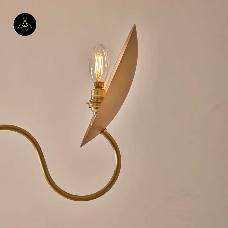 Wood and Brass Chandelier – Arlo 4-Light Bronze Reflectors 4 Close-up of a bronze reflector disc on the wood and brass chandelier