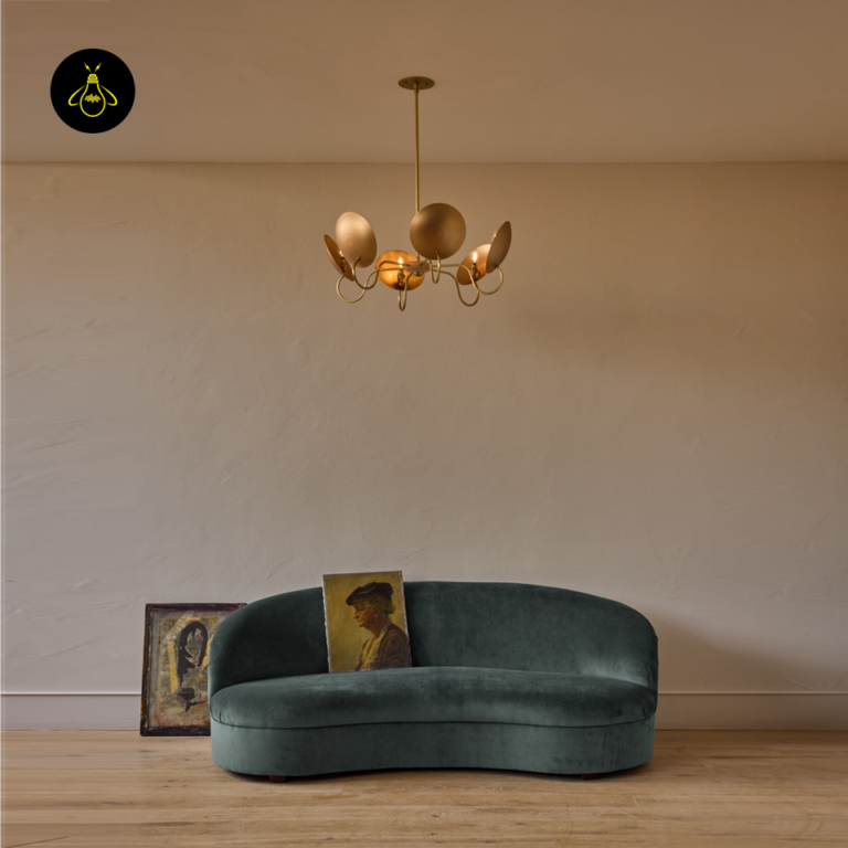 Handcrafted bronze reflector detail on the Arlo wood and brass chandelier