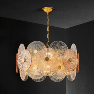 Close-up of clear and amber fluted glass discs on a gold fluted glass chandelier