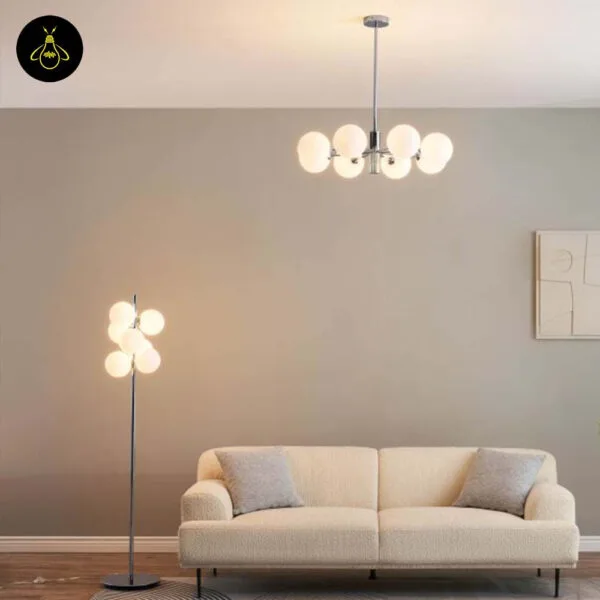 Chrome floor lamp with opal borosilicate glass spheres in a living room