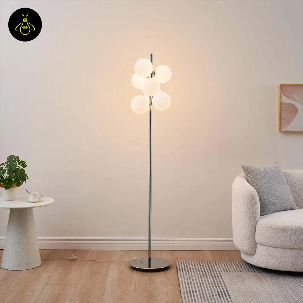 Chrome Floor Lamp with 7 White Glass Spheres – 161 cm 7 Chrome glass-sphere floor lamp in a luxury interior