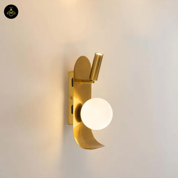 Bedroom reading light fixed the other way up, reading spot above the opal borosilicate glass globe on a brushed gold leaf