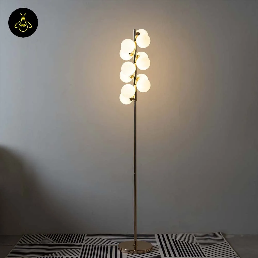 White Globe Floor Lamp – 12 Gold-Framed Opal Spheres | Ambrosia 2 Close-up of white globe floor lamp showing opal-glass spheres on a polished gold frame