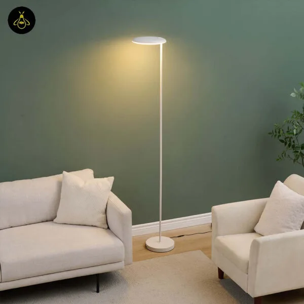 Tilting edge-lit disc head of the white LED floor lamp with adjustable head and integrated warm LED