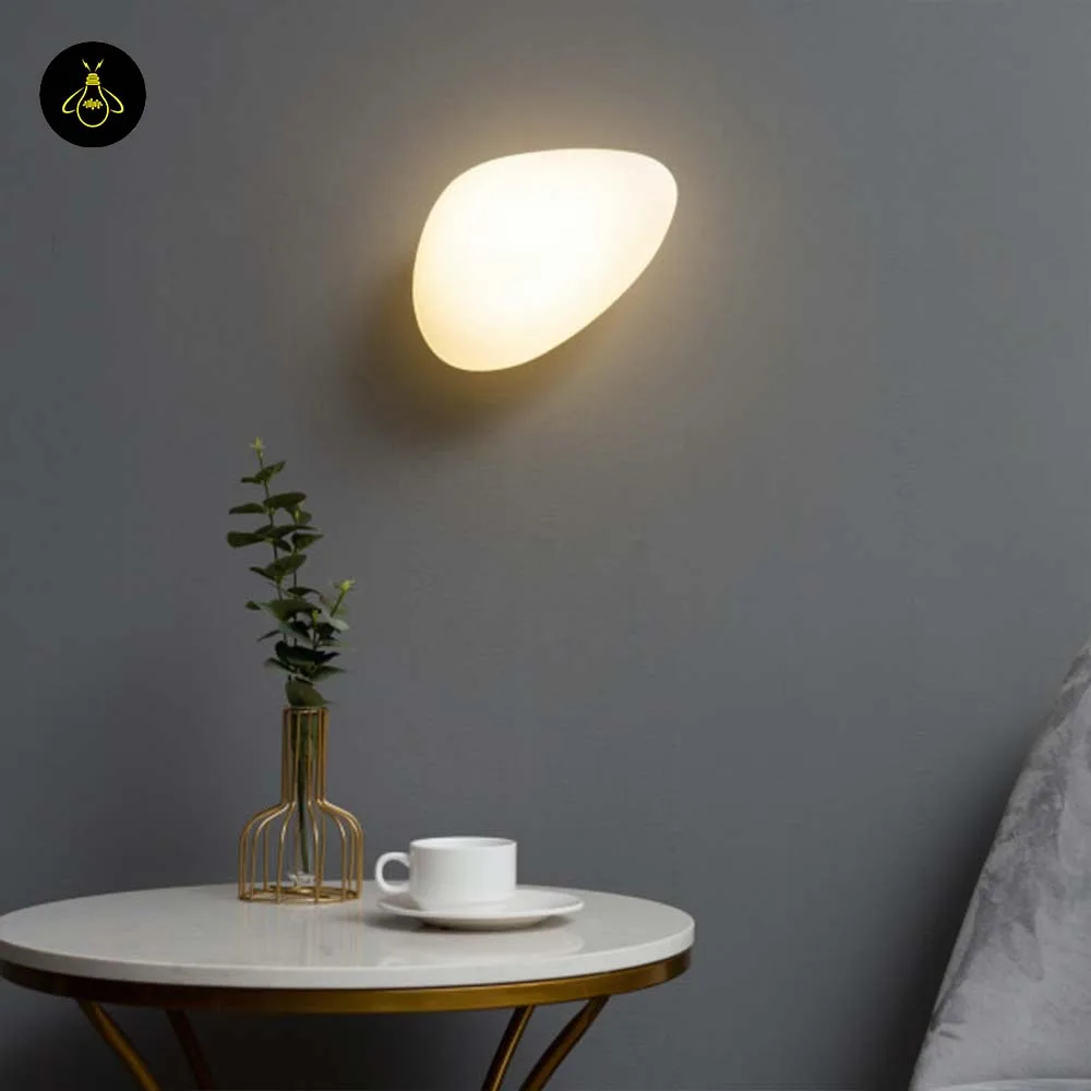 White Opaline Wall Light – Veglia 25 cm Glass Disc 11 Angled view of the white LED wall light with a rounded opaline diffuser