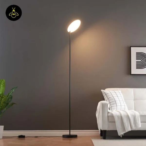black LED floor lamp with adjustable head in a living room