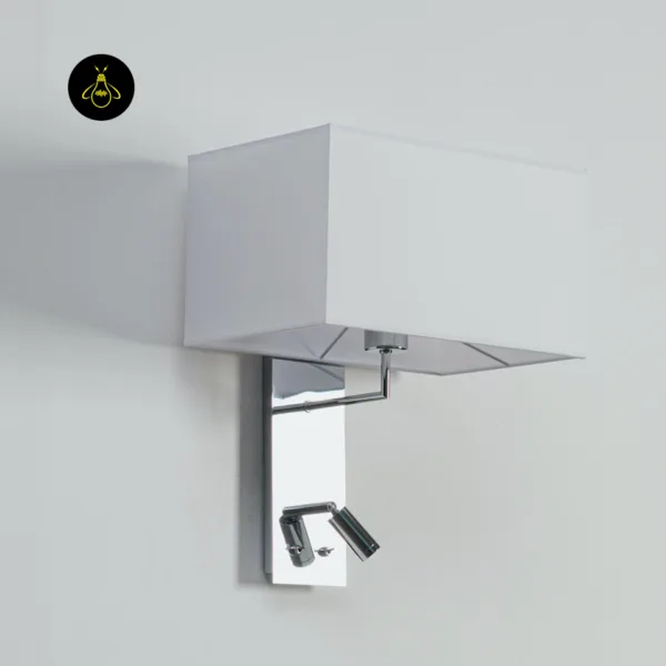 Chrome stainless steel backplate, swivel reading spot and two switches of the wall mounted bedside light
