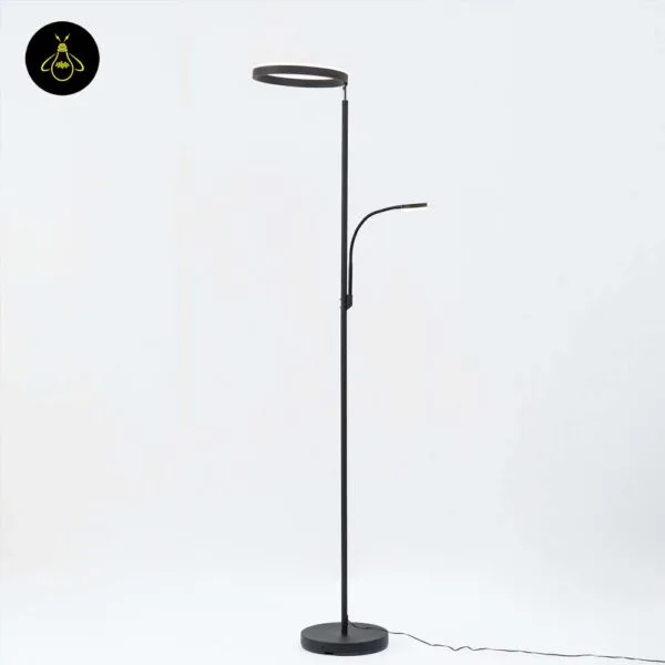 Energy-efficient black LED floor lamp with reading light in a hotel room