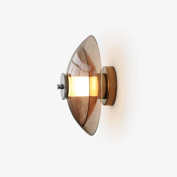 Amber glass wall light with a 30 cm amber borosilicate glass saucer, opal borosilicate glass diffuser and polished chrome stainless steel cap, lit, side view