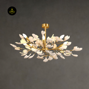 White ceramic ginkgo leaf chandelier with gold branches, angled view for a living room