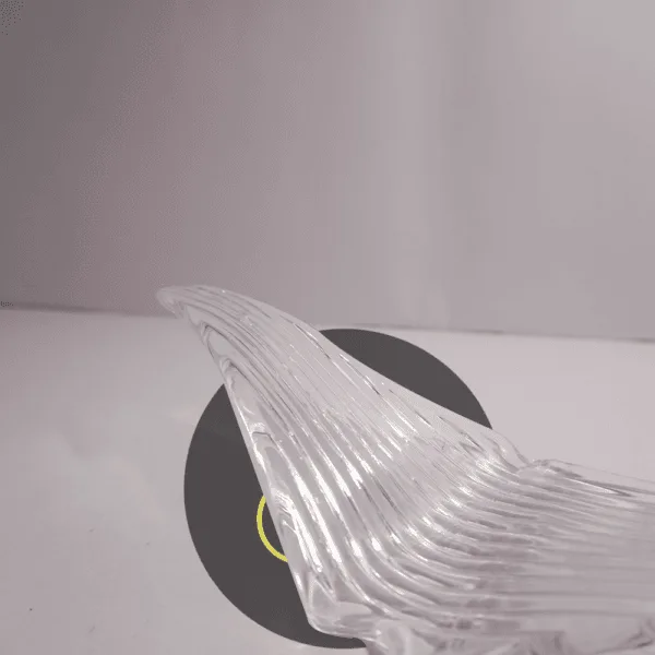 Close-up ribbed detail of glass bird-wing chandelier part from Jagmag Lights