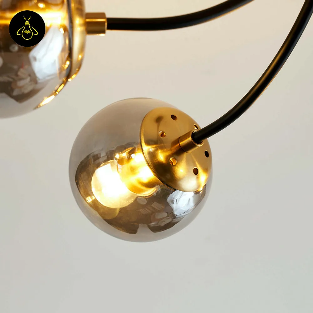 Black Glass Chandelier – 6-Light Smoke Glass Globe Semi-Flush 7 Six-globe black glass chandelier with smoke-grey balls and brass bulb cups