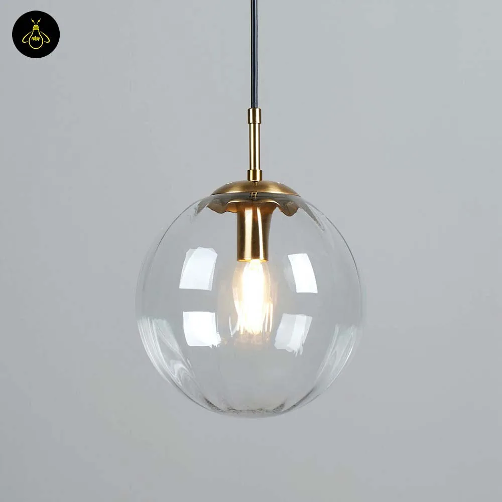 Ribbed Glass Ball Pendant Light – Smoked Finish 7 Glass ball pendant hanging in living room – adjustable drop height shown