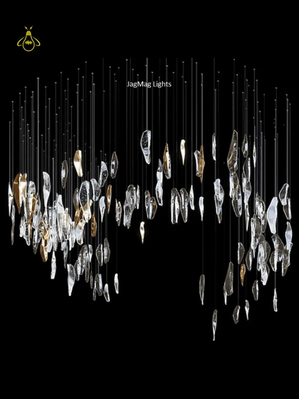 Glass jhumar cascade chandelier with clear and gold-lustre borosilicate glass leaves in a staggered drop for a staircase
