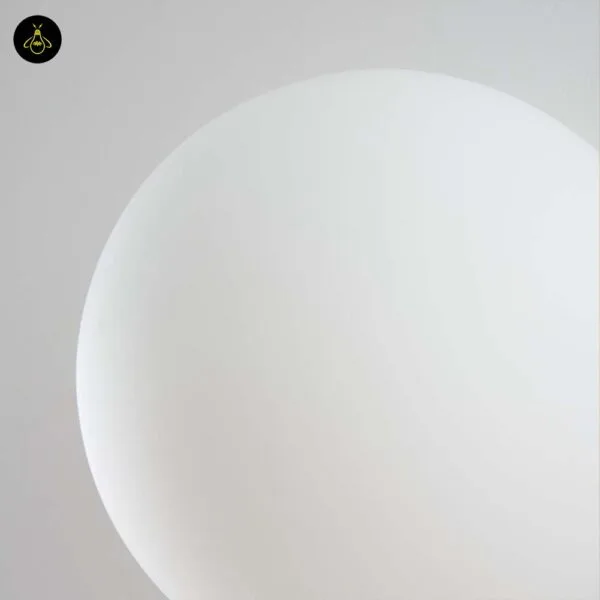Close-up of the opal borosilicate glass ball of the globe wall light