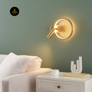 Gold LED circle wall light by Jagmag Lights with reading spot