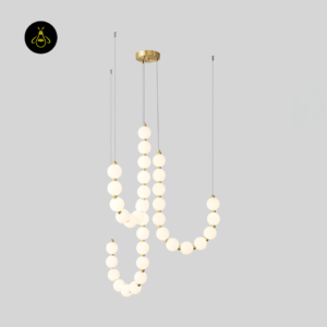 Gold orb pearl necklace chandelier strands hanging from a brass canopy