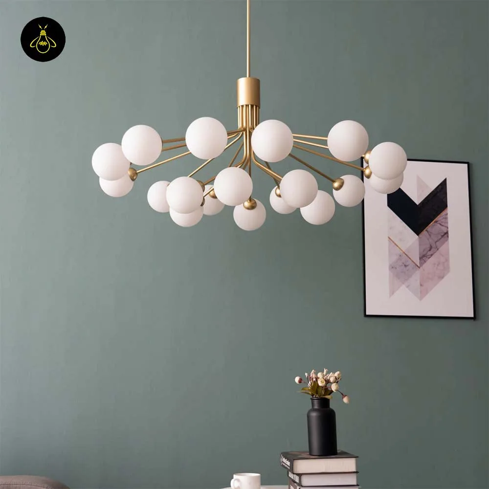 Modern chandelier for living room in gold with 18 white opal glass globes on a sputnik frame