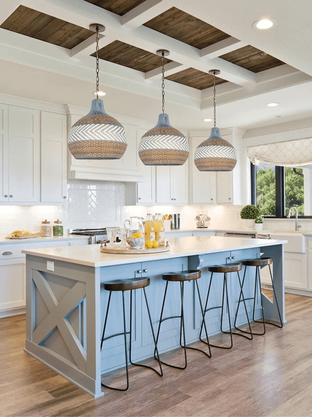 Rattan Hanging Lamp – Handwoven Coastal Pendant, 40 cm 4 Handwoven rattan hanging lamp over a coastal blue kitchen island with bar stools – Jagmag Lights