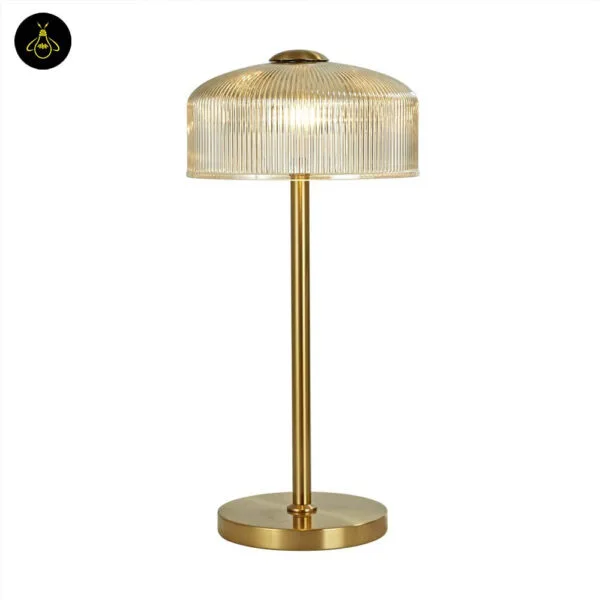 Amber glass table lamp for hospitality and guest-room lighting