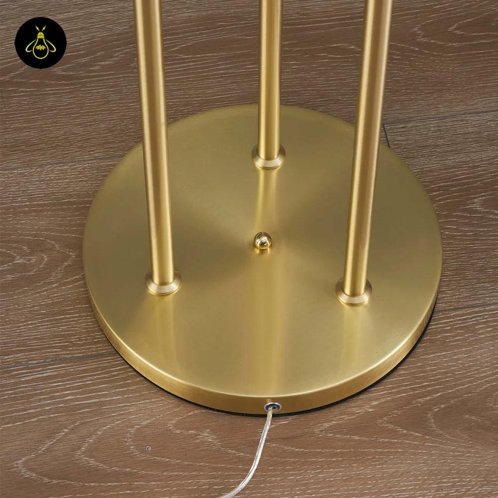 Triple Amber Glass Floor Lamp – 3-Light Gold Ribbed Glass Statement 5 Triple amber glass floor lamp with gold frame standing beside a sofa