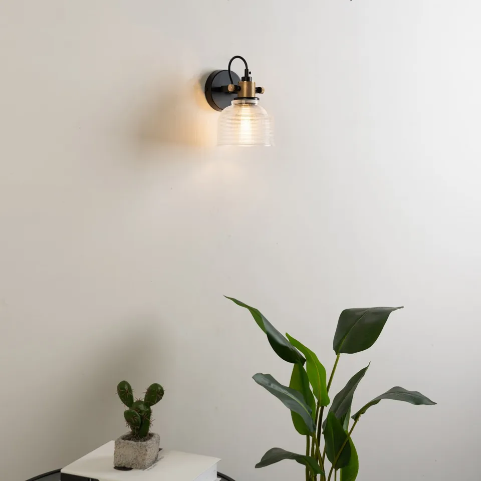 Textured Glass Wall Light – Adjustable Ribbed Bell Sconce, 14.5 cm 14 Textured glass wall light with a warm amber-like glow for indoor rooms