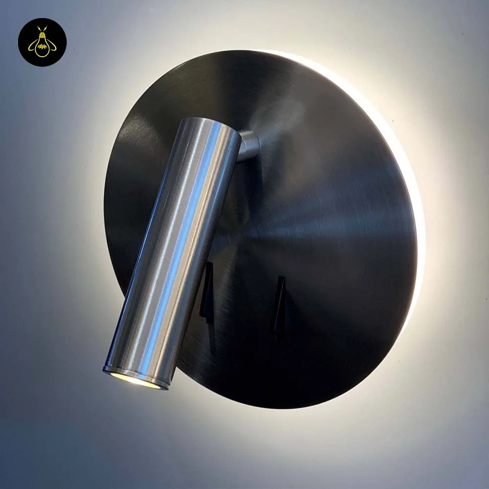 Wall Mounted Reading Light – LED Double Light, Chrome Finish 6 Side view of the wall lamp for bedroom: cylindrical LED spot on a swivel joint, halo lit behind the disc
