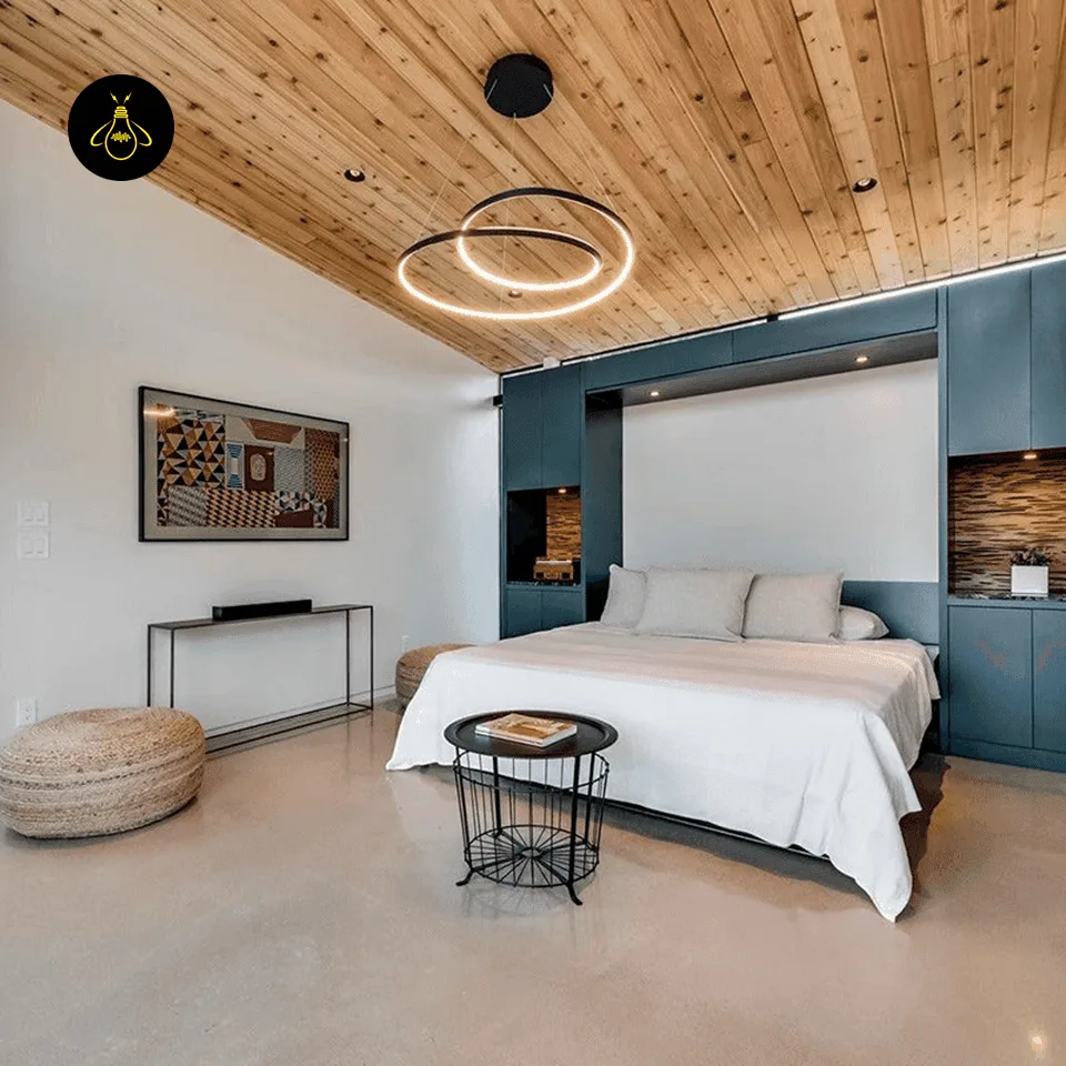 Spiral Ring Chandelier – 62 cm Integrated LED, 3 Finishes | Jagmag Lights 3 Spiral ring chandelier installed over a bedside in a modern bedroom