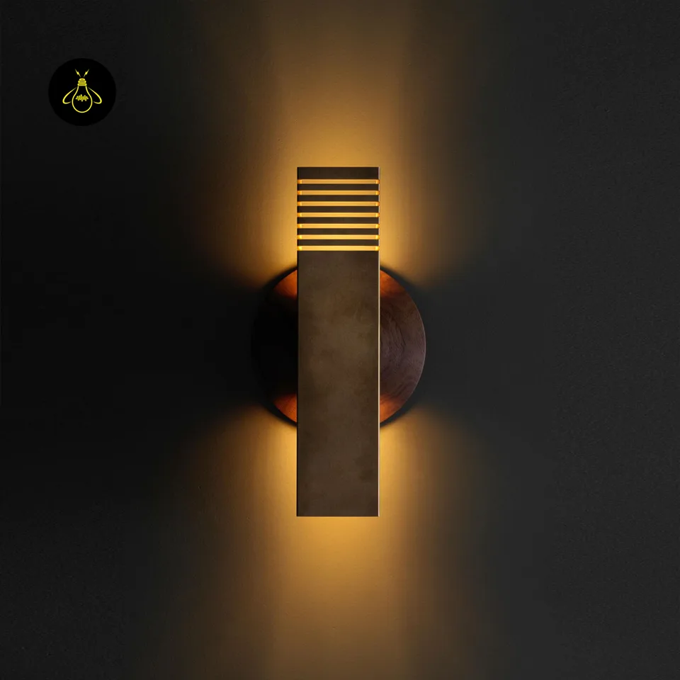 Boundary Wall Light – Brass-Finish Up & Down Sconce, 10.5 in 2 Boundary wall light casting a warm up and down glow on a wall at night