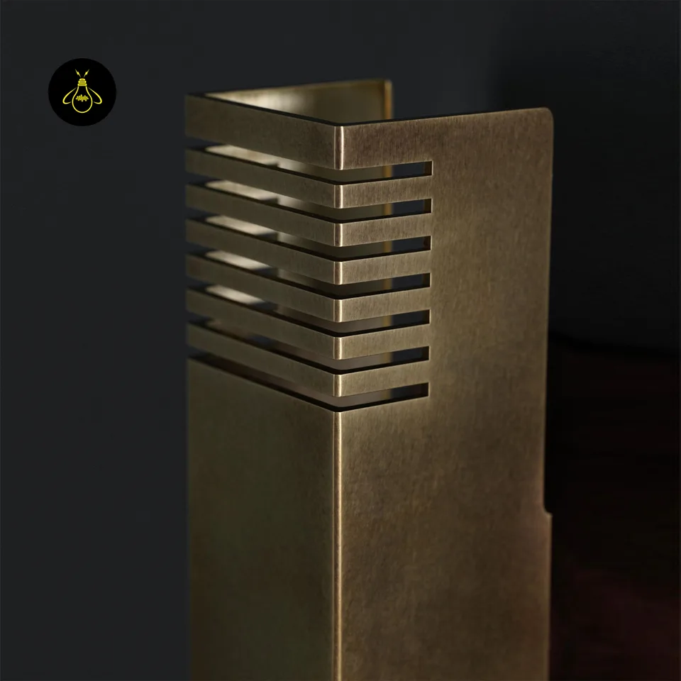 Boundary Wall Light – Brass-Finish Up & Down Sconce, 10.5 in 7 Side view of boundary wall light horizontal milled channels in brass
