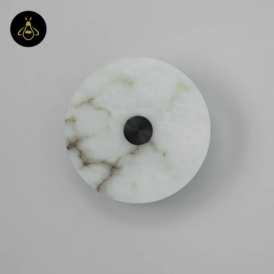 Alabaster Wall Light – Eclipse Disc Sconce, 4 Sizes | JagMag Lights 3 Unlit alabaster wall light showing natural white stone veining across the round disc