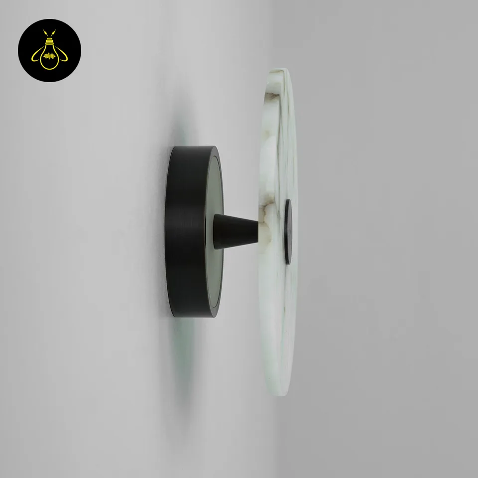 Alabaster Wall Light – Eclipse Disc Sconce, 4 Sizes | JagMag Lights 6 Alabaster wall light side profile with round stone disc on a black cylindrical wall mount