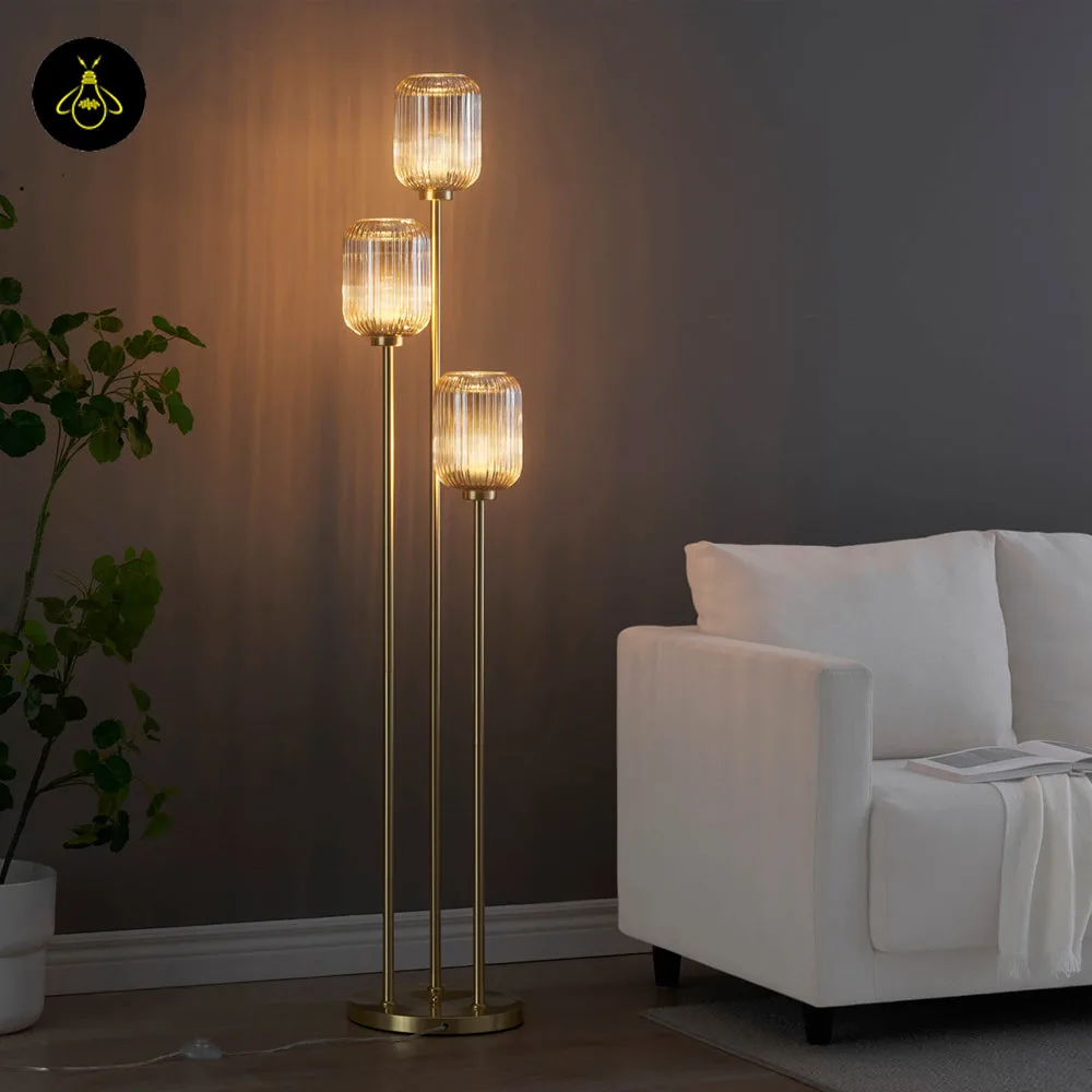 Triple Amber Glass Floor Lamp – 3-Light Gold Ribbed Glass Statement 8 Triple amber glass floor lamp styled in a hospitality lounge interior