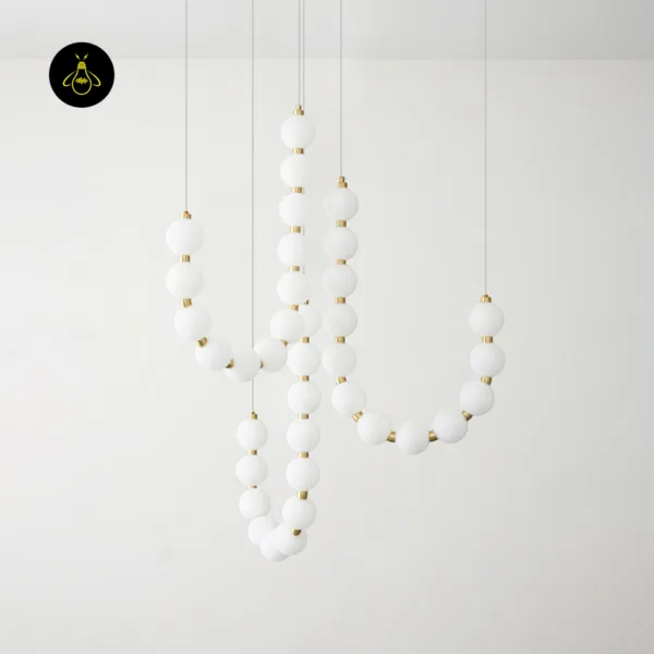 Jagmag pearl necklace chandelier with white opal orbs and gold detailing
