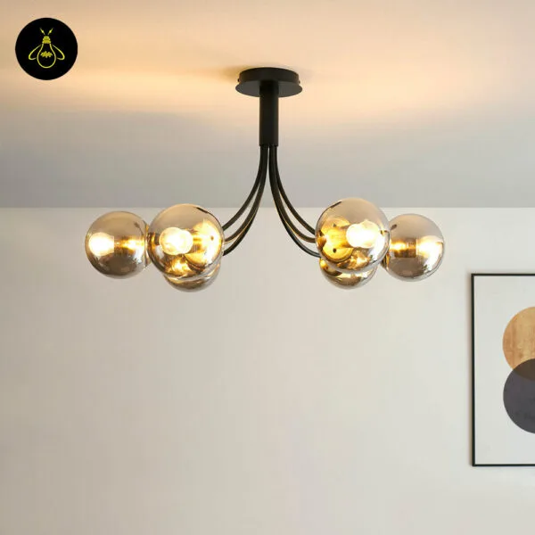 Smoked borosilicate glass globe chandelier in matte black mounted on a bedroom ceiling